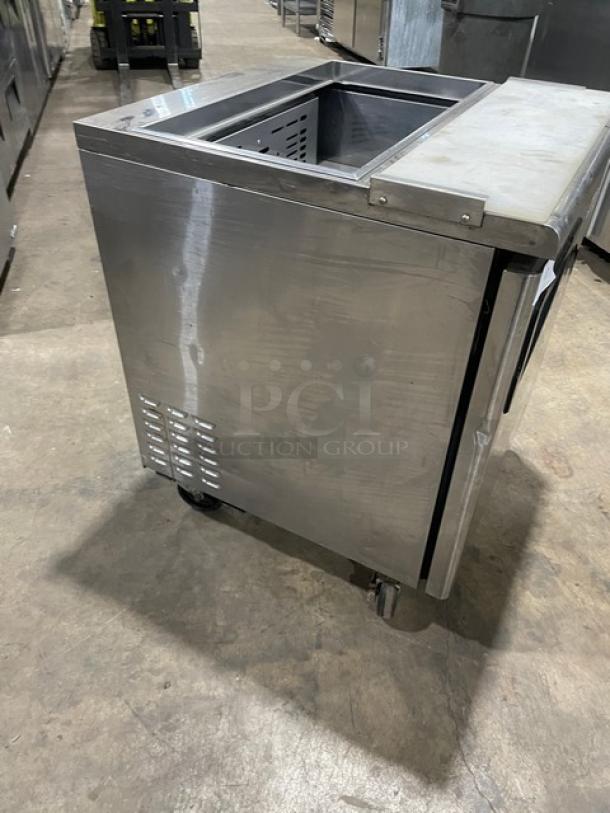 Turbo Air TST-28SD stainless steel refrigerated prep table, single door, with cutting board, on casters, 115V.