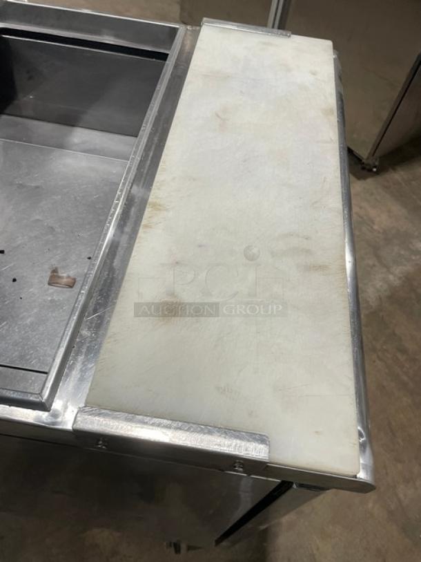 Turbo Air TST-28SD stainless steel refrigerated sandwich prep table with cutting board, on casters, 115V, used condition.