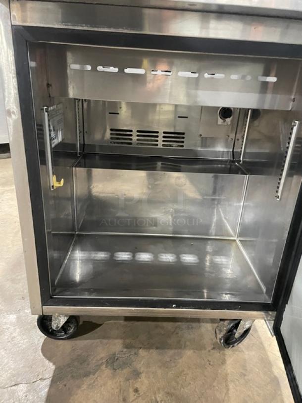 Turbo Air TST-28SD stainless steel refrigerated prep table, single door, cutting board, casters, 115V, excellent condition.
