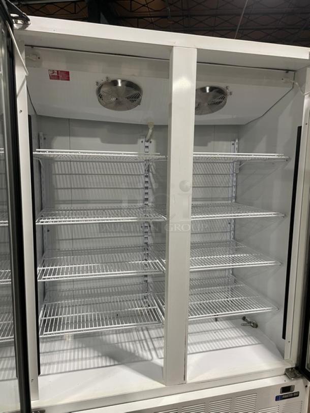 Master-Bilt BLG52HD commercial merchandiser refrigerator, double glass doors, poly-coated racks, 1 phase, excellent condition.