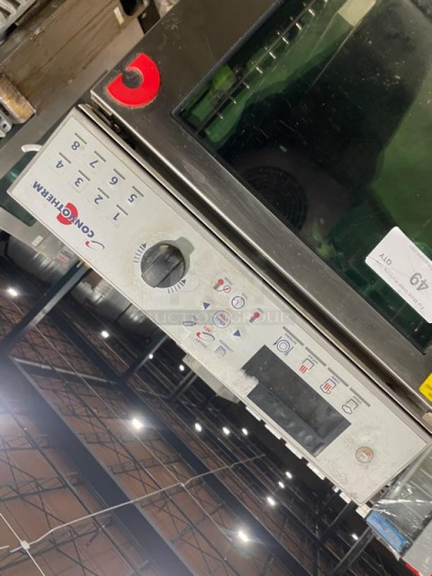 Convotherm OES610Mini stainless steel electric combi oven with digital controls, single undershelf, on legs.