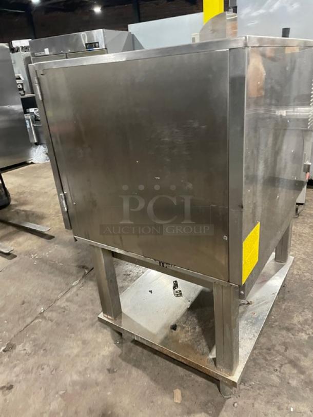 Alto-Shaam Combitherm 714MLG stainless steel combi oven, natural gas, with wired oven rack and single undershelf, on legs.