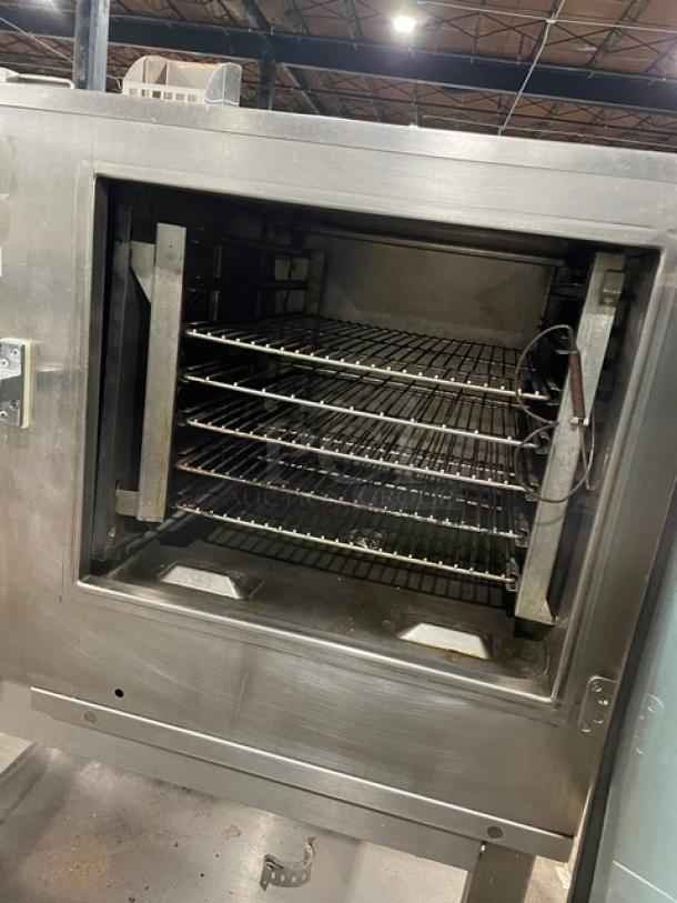 Alto-Shaam 714MLG Combitherm stainless steel combi oven with wired rack, undershelf, legs; natural gas; SN: 6954229009H.