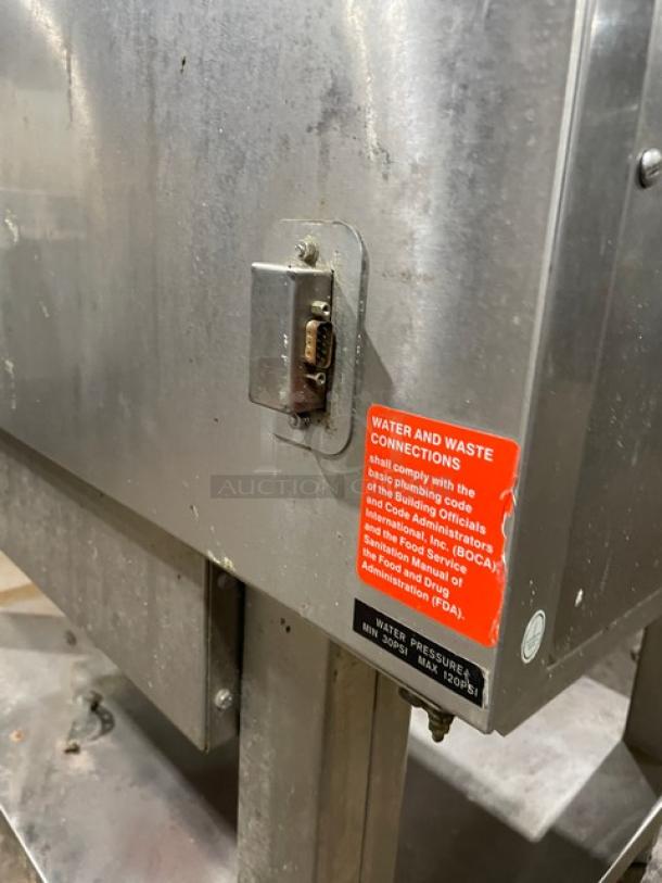 Alto-Shaam Combitherm 714MLG commercial stainless steel combi oven with wired rack, single undershelf, and visible warning label.