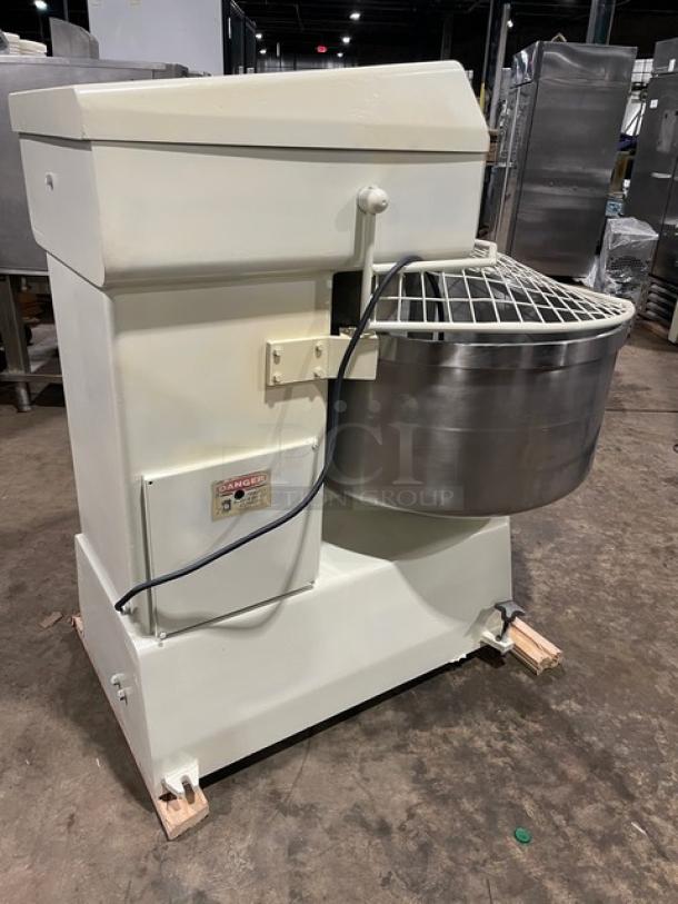 VMI SPI220M commercial spiral mixer with bowl guard, removable bowl, and dough hook. Heavy duty, 220V, 3 phase. Model SN: 68635.