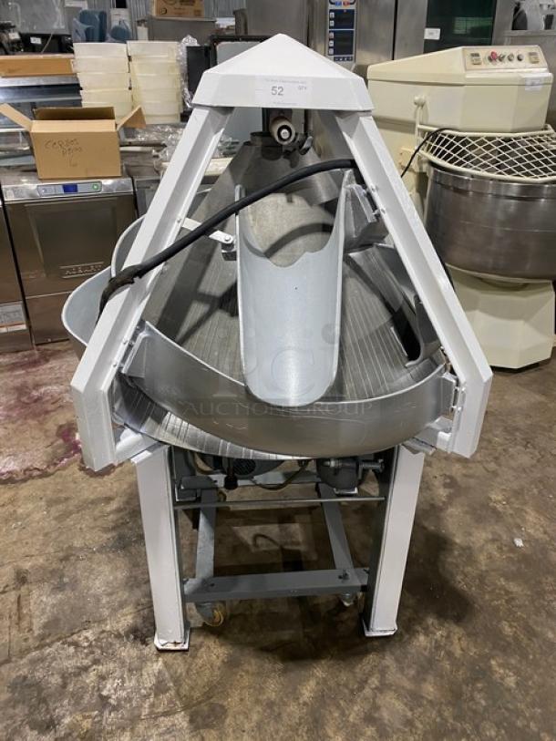 Benier commercial conical dough rounder on legs and casters, electric powered, white frame, visible control panel, lightly used.