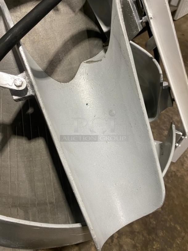 Benier commercial electric conical dough rounder, freestanding with legs and casters, gray finish, visible wear.