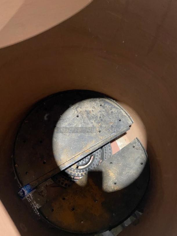 Commercial stainless steel tandoor oven on casters, showing interior with gas burner. Ideal for professional kitchens.