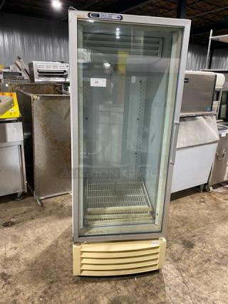 Carrier ULG30BS5 white commercial reach-in merchandiser refrigerator with single glass swing door, and poly-coated rack.