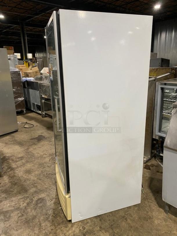 Carrier commercial white reach-in refrigerator, model ULG30BS5. Single glass swing door, poly-coated wired rack.
