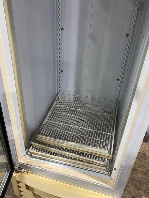 Carrier ULG30BS5 glass door merchandiser refrigerator with poly-coated wire rack, model SN: 7350018, 115V 1 Phase, commercial use.