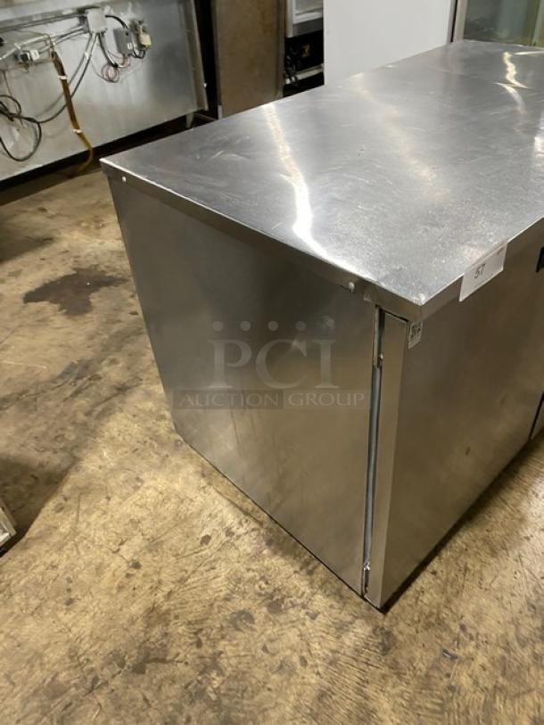 Delfield Stainless Steel 2 Door Undercounter Worktop Refrigerator, Model UC4048PSTAR, with coated wire rack, on casters.