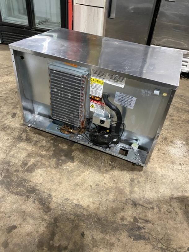 Delfield UC4048P-STAR 2 Door Undercounter Refrigerator, stainless steel, SN: 1810152001729, 115V, with coated wired rack, on casters.