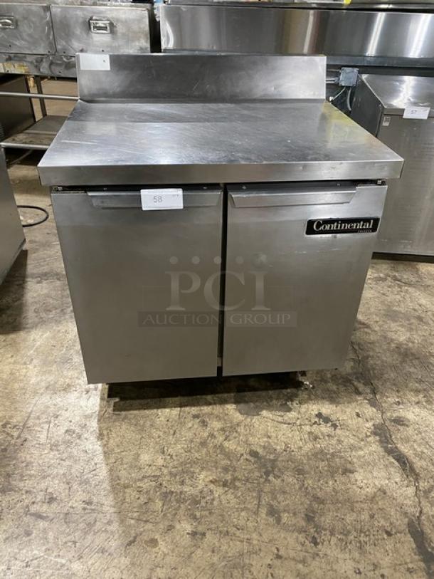 Continental Commercial Stainless Steel 2-Door 36" Worktop Freezer, Model SWF36-BS, with up-turned backsplash, on casters.