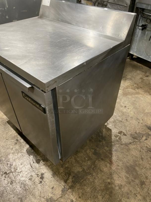Continental SWF36BS stainless steel worktop freezer with up-turned back splash, 2 doors, on casters, model SWF36-BS.