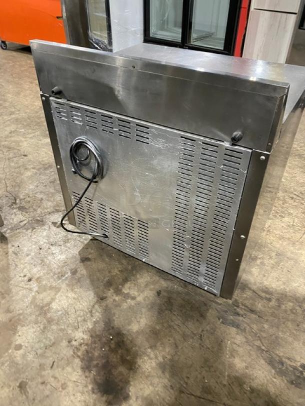 Continental SWF36BS stainless steel 2-door worktop freezer with up-turned backsplash, on casters, 115V 1 Phase, Model SN: 15684026.