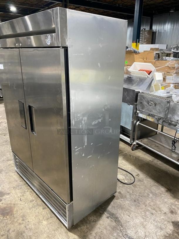 True T-49F stainless steel 2-door commercial freezer with poly-coated rack. Model T-49F, SN: 1-3198372, 115V, 1 Phase. Used condition.