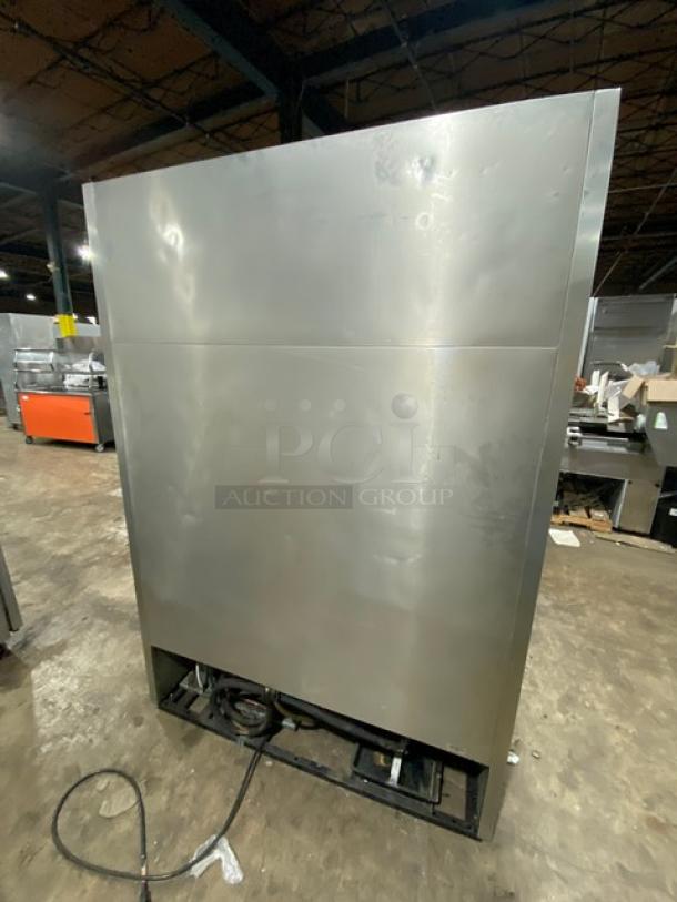 True T-49F commercial freezer, stainless steel, 2 solid doors, poly coated rack, 115V, used condition, Model: T-49F SN: 1-3198372.