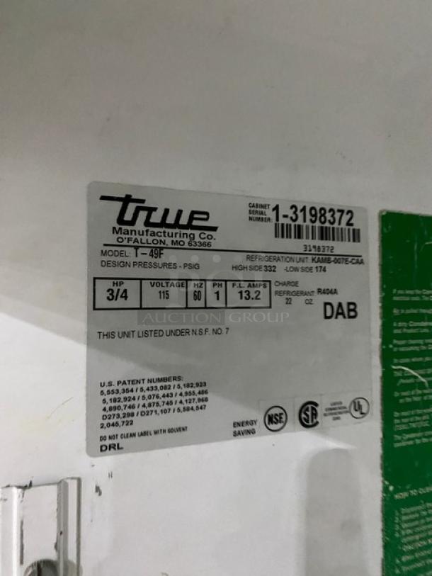 True Commercial Stainless Steel 2 Door Reach In Freezer, Model T-49F, with Poly Coated Wired Rack, Serial 1-3198372, 115V.