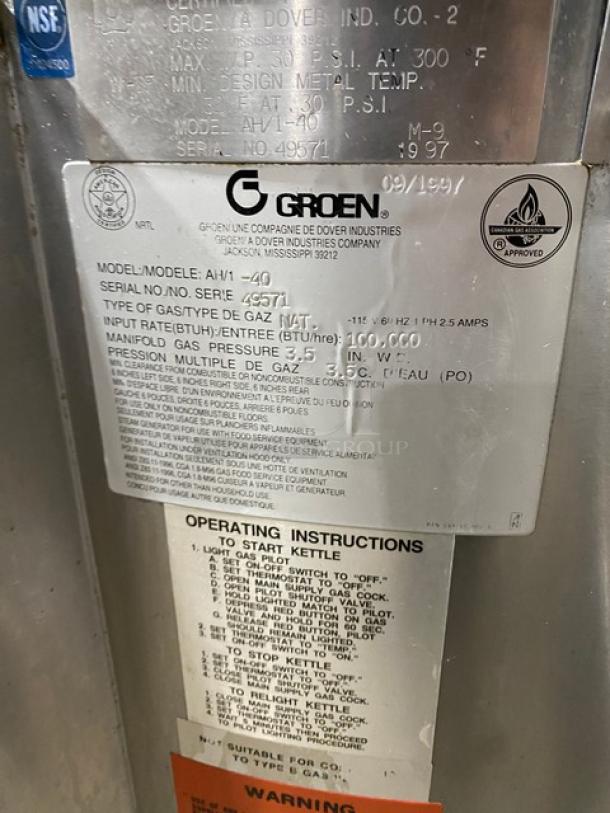 Groen stainless steel steam jacketed kettle, model AH/1-40, natural gas-powered, 40 lb capacity, with operating instructions visible.