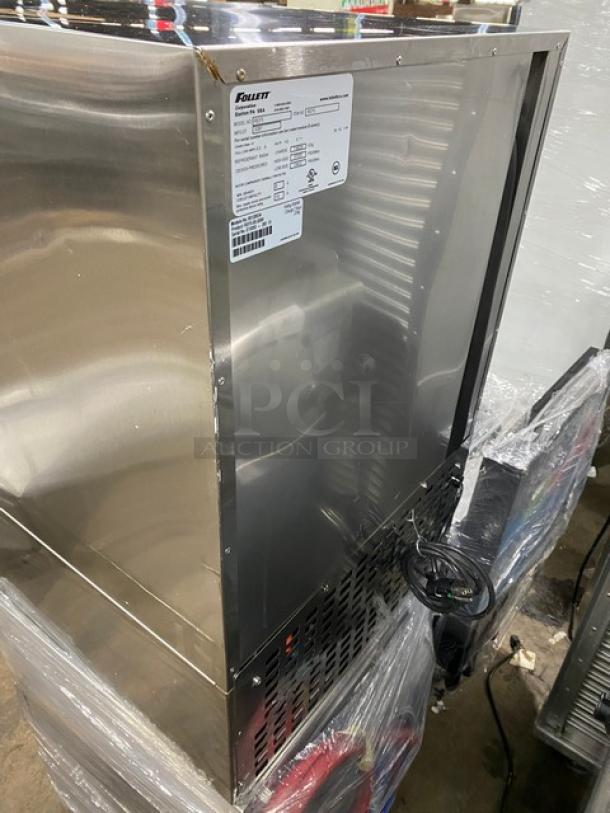 Follett REF Series stainless steel single door medical-grade undercounter refrigerator, model REF5, SN: E15950-28513, 115V, with poly coated wired rack.