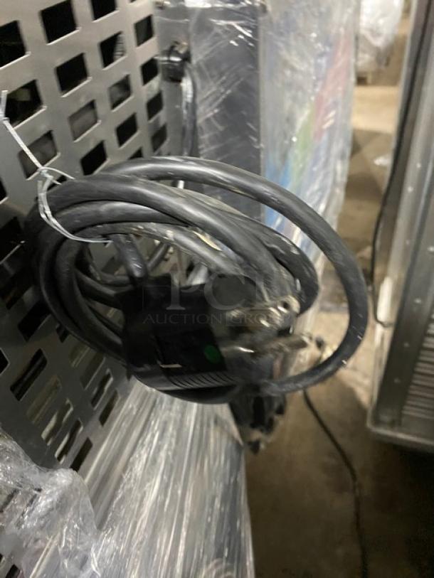 Follett REF5 stainless steel undercounter refrigerator, commercial-grade, with poly coated rack. SN: E15950-28513, 115V, 1 Phase.