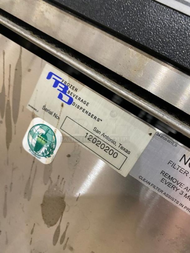 FBD stainless steel 4-flavor frozen beverage dispenser, electric-powered, Serial No: 12020200, Jolly Rancher style.