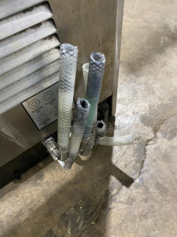 FBD Stainless Steel 4-Flavor Beverage Dispenser, electric powered, Jolly Rancher style, SN: 12020200, countertop model.