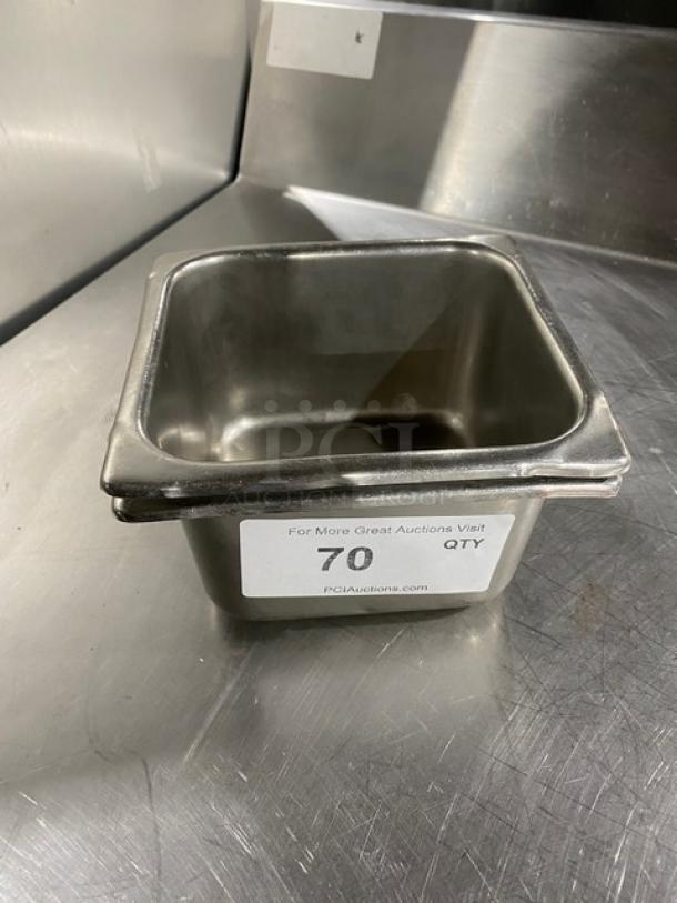 Commercial stainless steel hotel/steamtable pan in used condition. Label indicates quantity of 70. Suitable for professional kitchens.