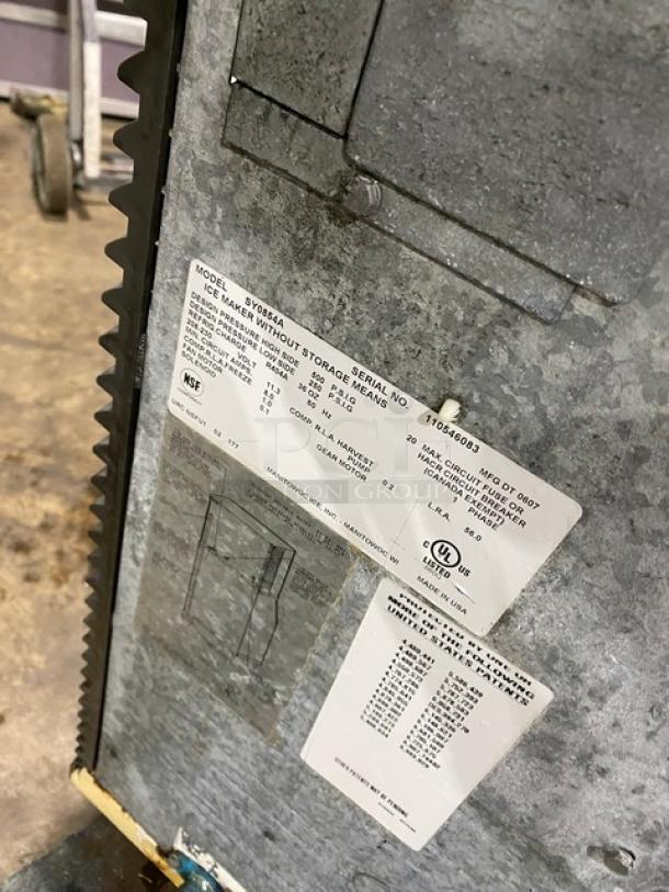 Manitowoc SY0854A stainless steel ice maker, electric, air-cooled, 208-230V, 1 Phase. Serial: 110546083. NSF, UL certified labels.