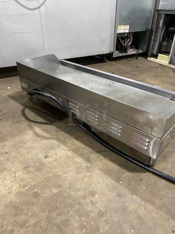 Copper Beech CBETG-48 stainless steel electric 48" countertop flat griddle with back and side splash, in used condition.