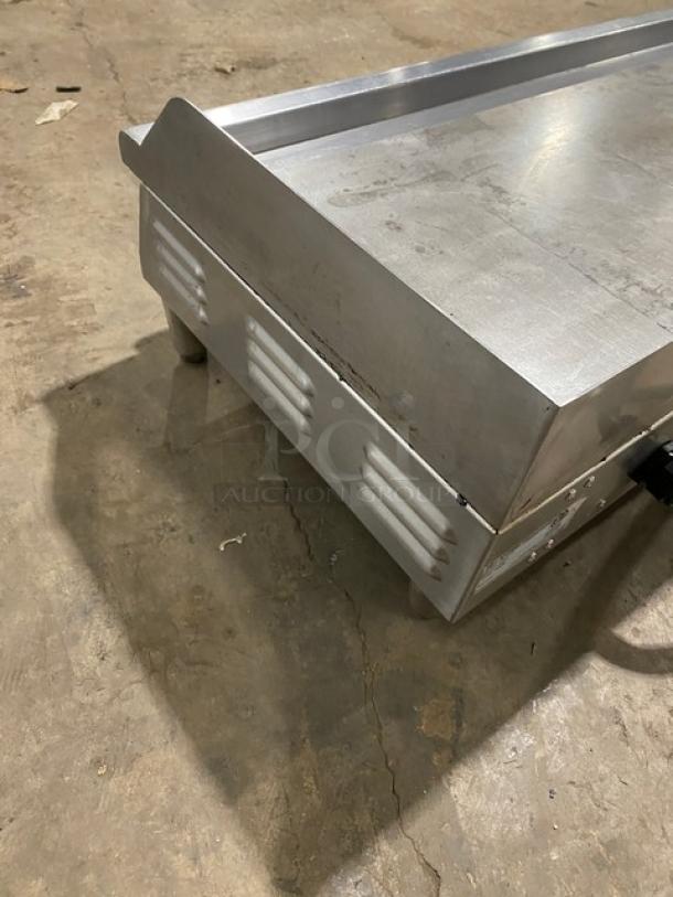 Copper Beech CBETG48 stainless steel 48" electric griddle, countertop model with back and side splash, 240V, on legs.