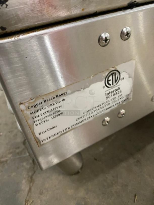 Copper Beech CBETG-48 commercial stainless steel 48" electric griddle with back and side splash, on legs, 240V, 4800W.