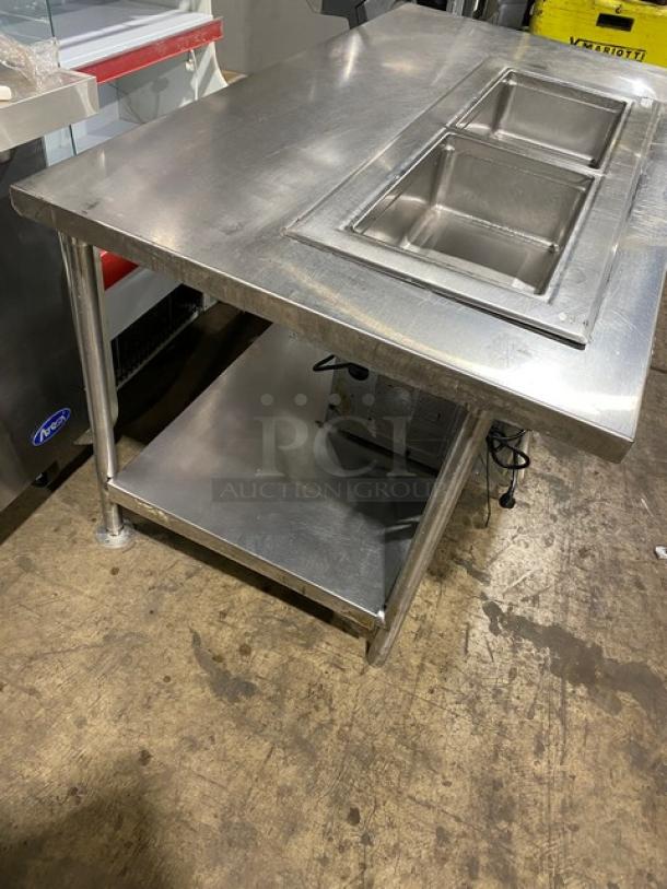 Delfield 8148EFNP commercial stainless steel 2-well refrigerated cold food table with undershelf, model on legs, 115V.
