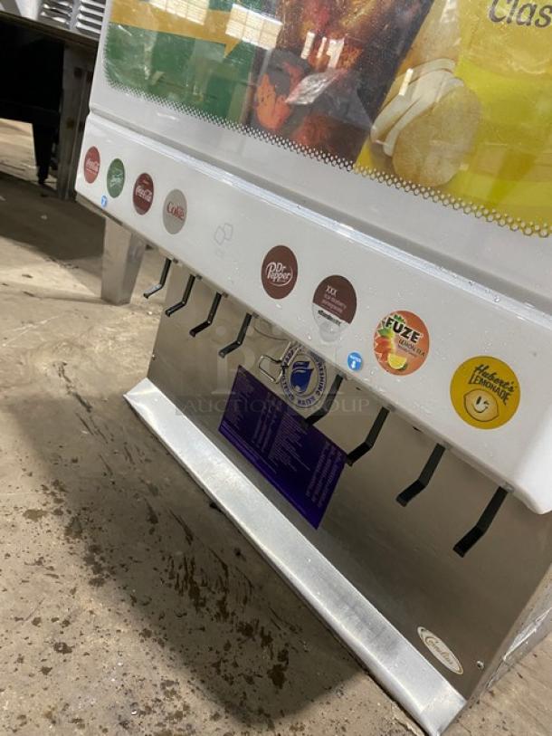 Cornelius ED250BCZ 8-flavor soda dispenser, countertop model with push button control, commercial use, clean condition.