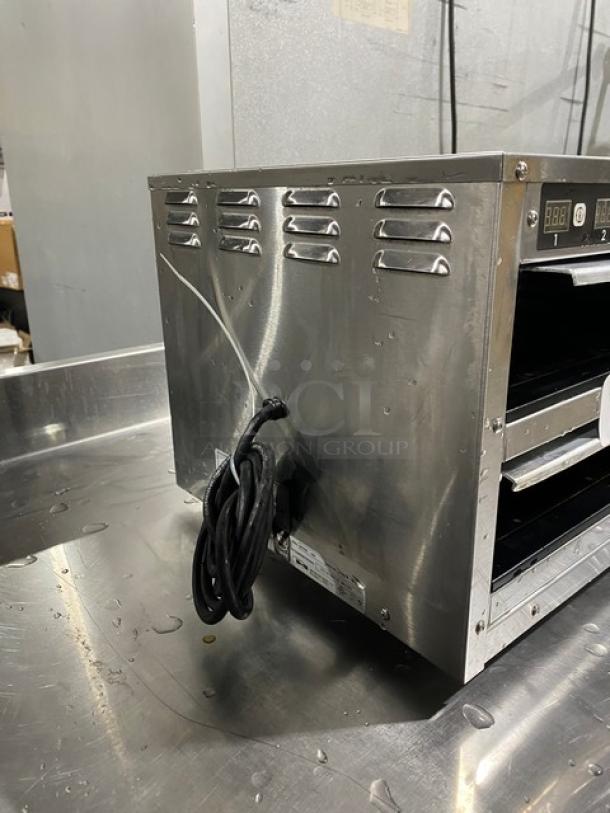 Carter Hoffmann stainless steel electric heated cabinet, model MC212S2-2DD, with programmable controls, 120V, 1 phase.