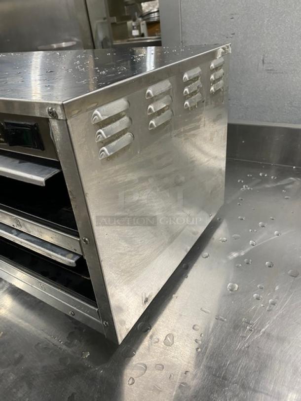 Carter Hoffmann stainless steel electric countertop modular heated holding cabinet, model MC212S2-2DD, with programmable controls.