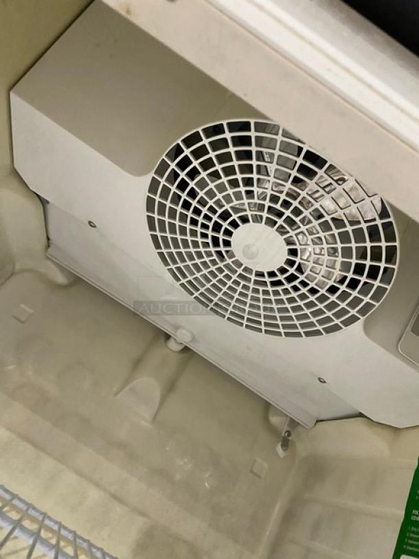 Turbo Air TGM14RV white commercial reach-in merchandiser with single glass swing door, features poly-coated wire rack, 115V 1 Phase.