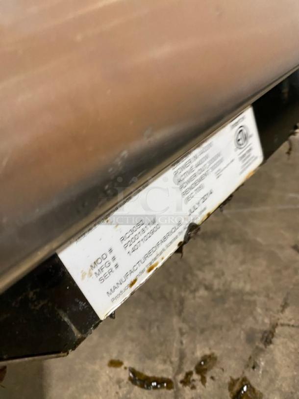 Amana 2014 commercial stainless steel heavy-duty microwave oven, model RC30S2, with programmable touchpad, serial 1407102900.