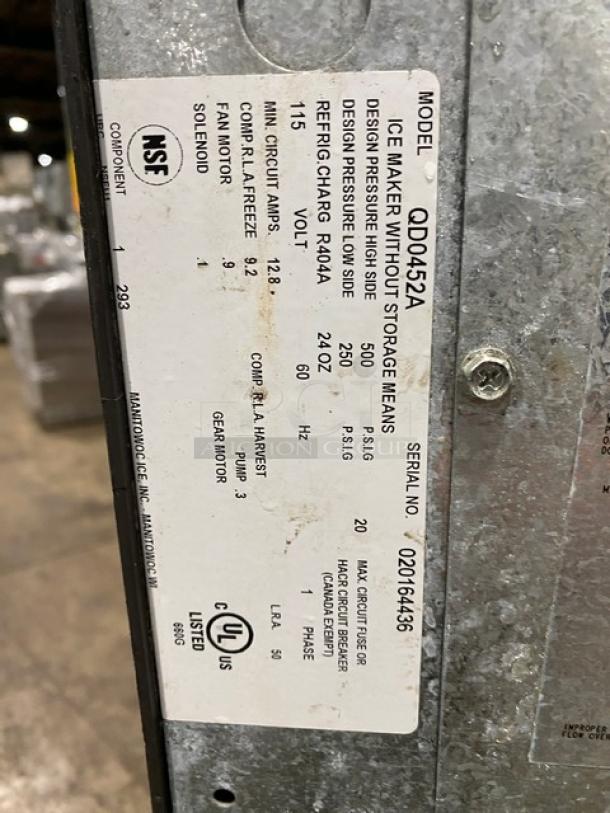 Manitowoc QD0452A ice machine with label details, featuring 115V, 1 phase, NSF and UL certifications. Serial No: 020164436.