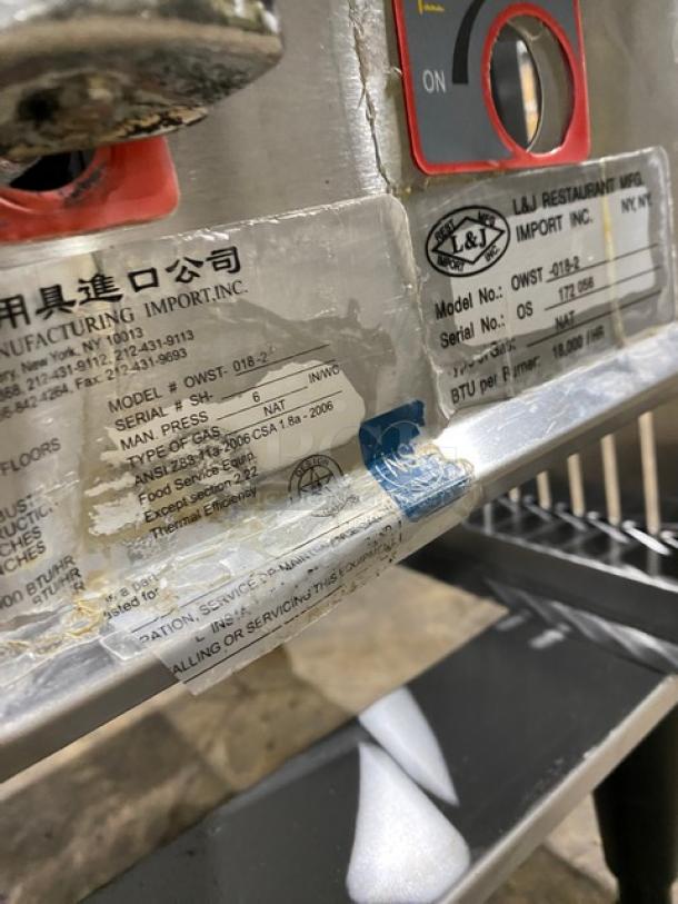 L&J stainless steel natural gas stock pot range, model OWST-018-2, SN: 172056, on legs, label details visible.