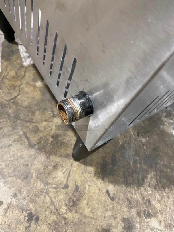 L&J Stainless Steel Natural Gas Single Burner Stock Pot Range, Model OWST0182, on legs, vented side panel, slightly worn.