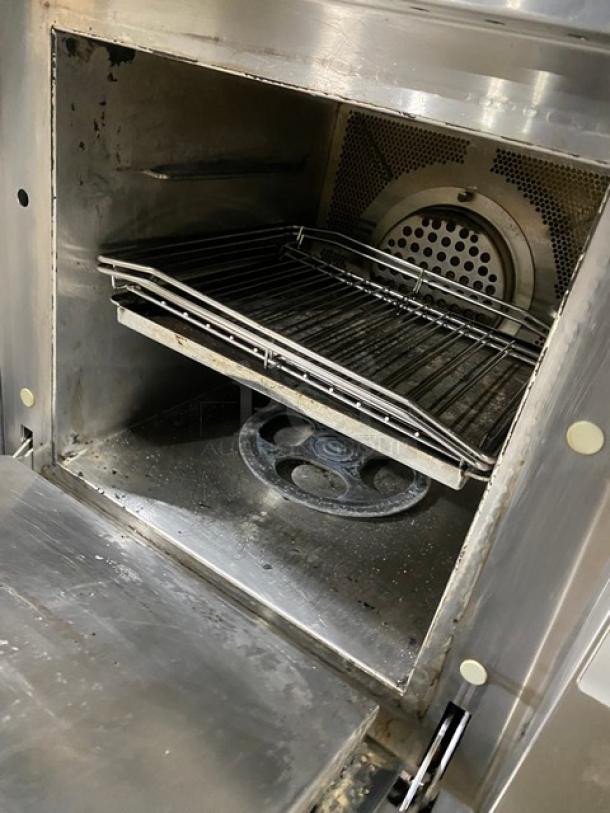 MerryChef Eikon E3 commercial rapid cook oven, stainless steel, 2019 model, with EasyTouch touchscreen, interior view.