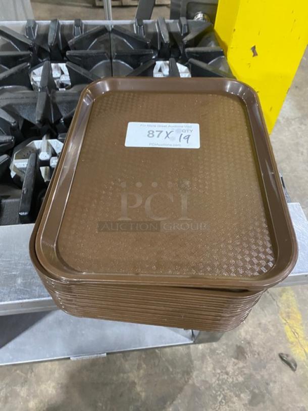 Cambro commercial brown rectangular tray, model 1418FF167, stack of 19, fast food/serving style, good condition.