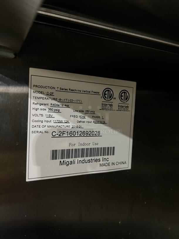 Migali Commercial Stainless Steel 2 Door Vertical Freezer, Model C-2F, Energy Star certified, on casters. Serial: C-2F16012692028.