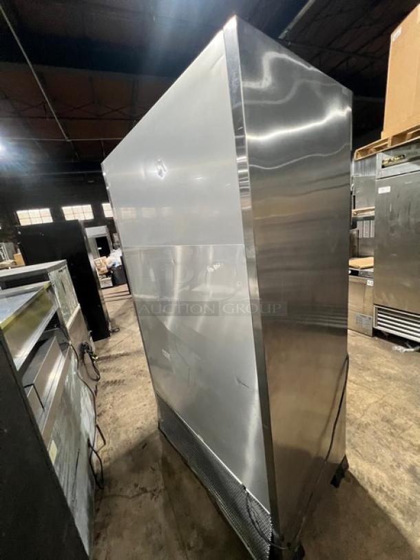 True TAC48LD stainless steel refrigerated display case, multi-tier, poly-coated wired rack, 208-230V, on legs.