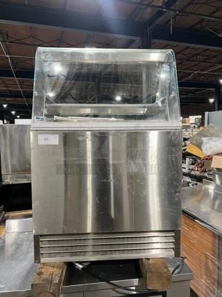 RPI Industries Vienna Series stainless steel curved glass gelato merchandiser, Model VIG32-R-CV-SC, in good condition.