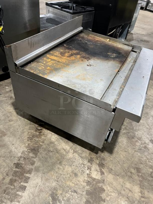 Imperial RG36 stainless steel 36" flat griddle with broiler, cheese melter, and up-turned backsplash. Natural gas, on legs.