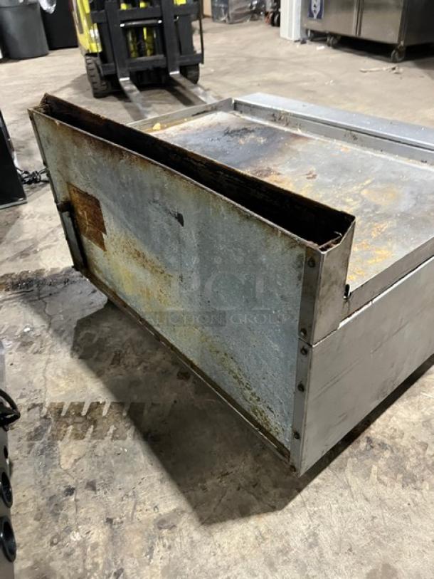 Imperial RG36 stainless steel natural gas griddle with broiler, raised 36", up-turned back splash, on legs, used condition.