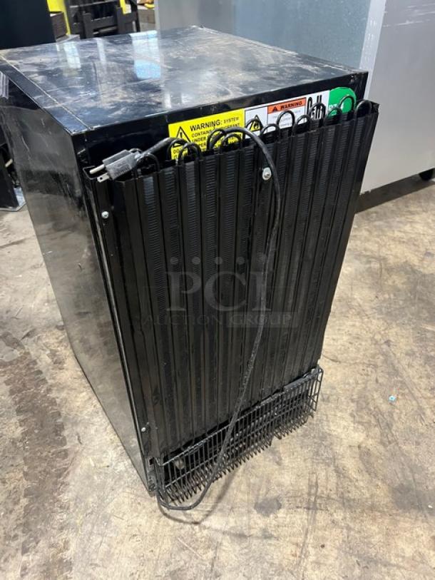 FrigoGlass 2020 black single glass door beverage merchandiser, model UR30CC, with poly-coated wire rack, in used condition.